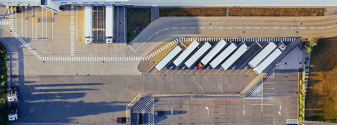 birds eye view of warehouse and trucks