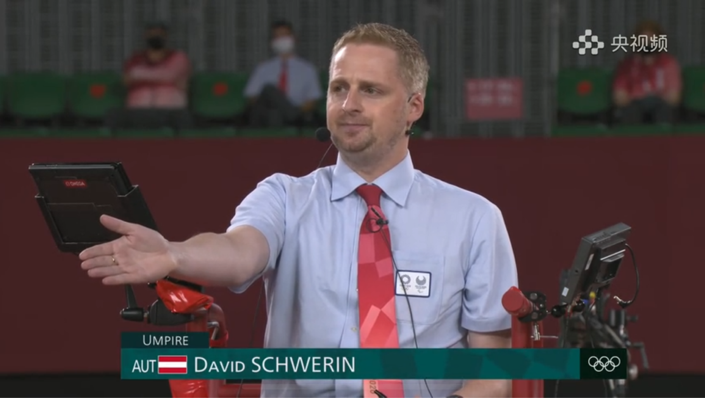 David Schwerin umpiring badminton match