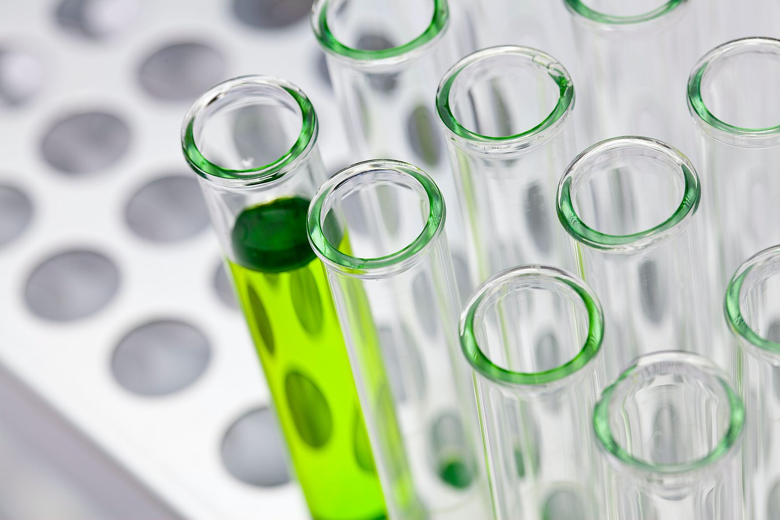green liquid in a glass test tube